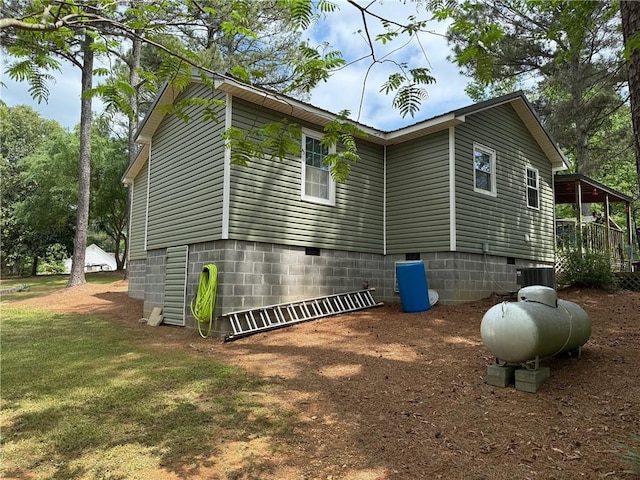 225 Hardin Rd SW, Plainville, GA 30733 - view of side of property with crawl space, central AC, and a yard