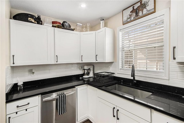 kitchen with a sink, white cabinetry, dishwasher, decorative backsplash, and recessed lighting