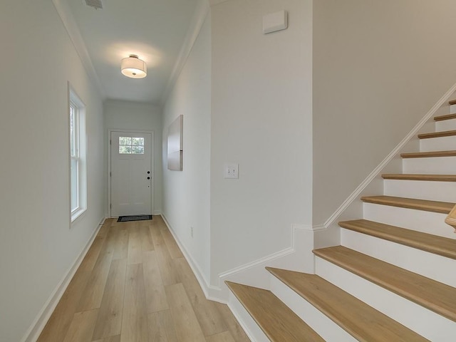 107 Winsome Way, Woodstock, GA 30188 - entryway with light wood-style floors, baseboards, and stairs