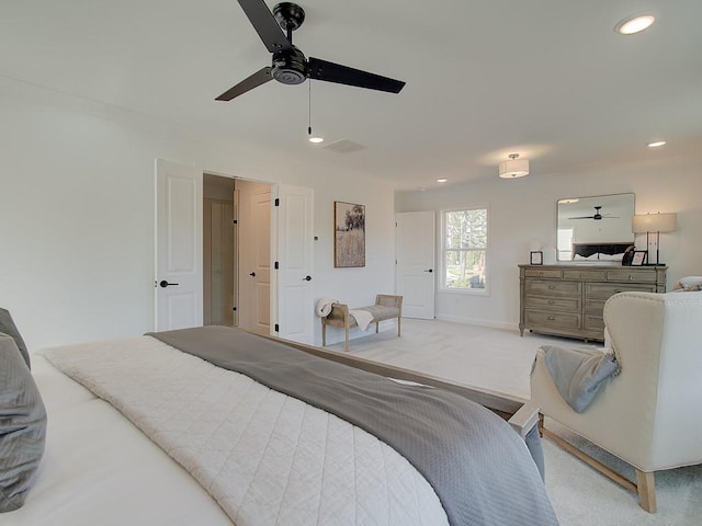 carpeted bedroom with ceiling fan