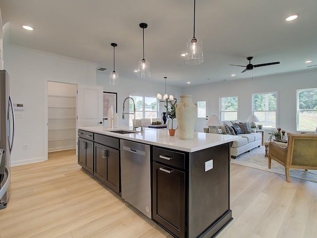 107 Winsome Way, Woodstock, GA 30188 - kitchen featuring a sink, ceiling fan with notable chandelier, light wood-style flooring, and dishwasher
