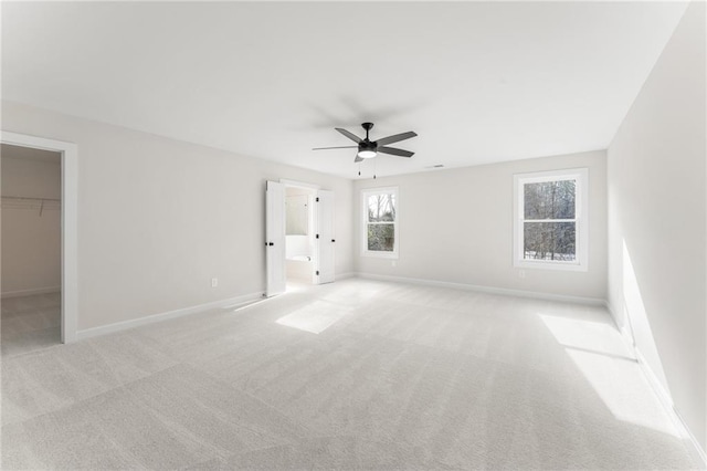 2719 Byess Ct, Marietta, GA 30064 - unfurnished bedroom featuring a spacious closet, light carpet, baseboards, ceiling fan, and a closet