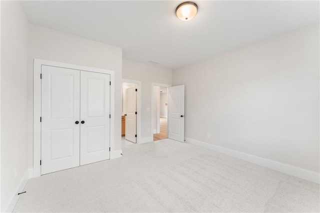 2719 Byess Ct, Marietta, GA 30064 - unfurnished bedroom featuring light carpet, baseboards, and a closet
