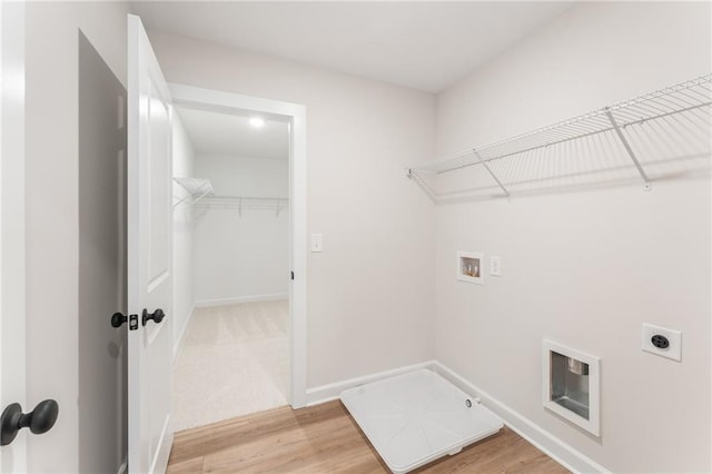 2719 Byess Ct, Marietta, GA 30064 - clothes washing area with hookup for an electric dryer, washer hookup, light wood-style flooring, and hookup for a gas dryer