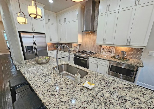 4107 Township Pkwy Unit 69, Sandy Springs, GA 30342 - kitchen with appliances with stainless steel finishes, wall chimney range hood, white cabinets, dark wood-style floors, and recessed lighting