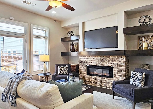 4107 Township Pkwy Unit 69, Sandy Springs, GA 30342 - living area featuring ceiling fan, a brick fireplace, and recessed lighting