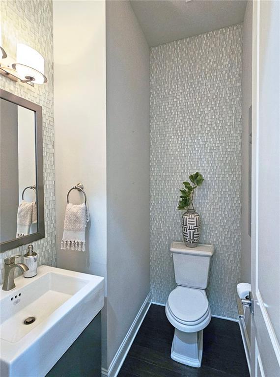 4107 Township Pkwy Unit 69, Sandy Springs, GA 30342 - bathroom with toilet and wood finished floors