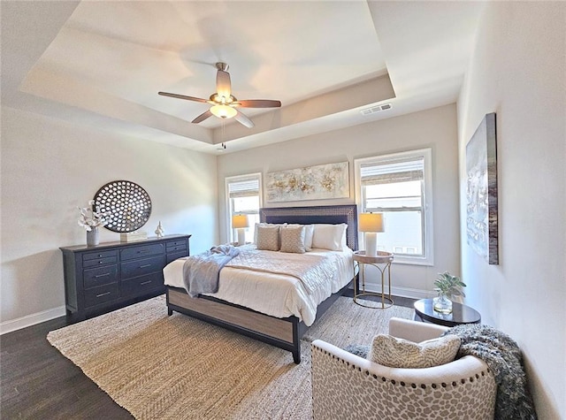 4107 Township Pkwy Unit 69, Sandy Springs, GA 30342 - bedroom with a raised ceiling, dark wood-type flooring, and ceiling fan