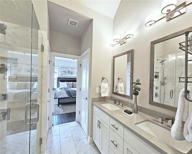 4107 Township Pkwy Unit 69, Sandy Springs, GA 30342 - ensuite bathroom with double vanity, marble finish floors, and a shower stall
