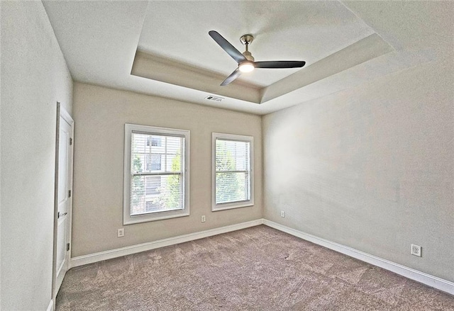 4107 Township Pkwy Unit 69, Sandy Springs, GA 30342 - carpeted spare room featuring a ceiling fan and a raised ceiling