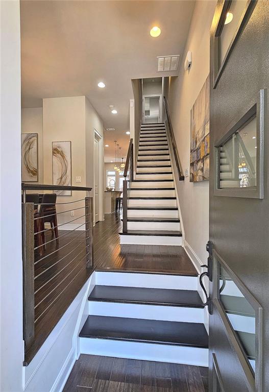 4107 Township Pkwy Unit 69, Sandy Springs, GA 30342 - stairs featuring wood finished floors and recessed lighting