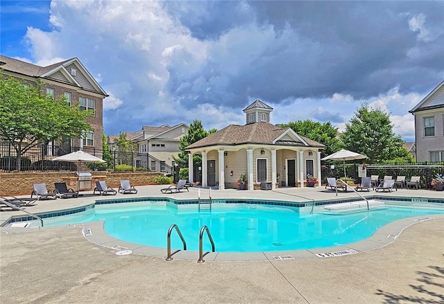 4107 Township Pkwy Unit 69, Sandy Springs, GA 30342 - community pool featuring a patio area
