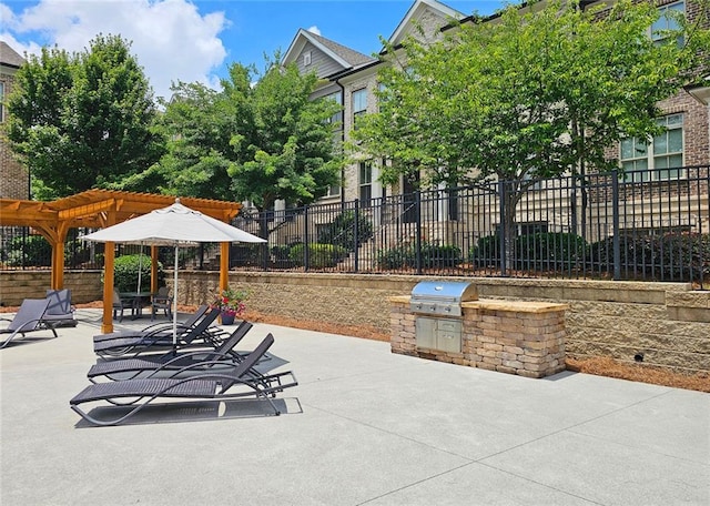 4107 Township Pkwy Unit 69, Sandy Springs, GA 30342 - fenced backyard with a pergola, a patio area, and area for grilling