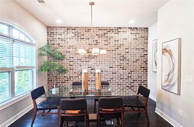 4107 Township Pkwy Unit 69, Sandy Springs, GA 30342 - dining room with brick wall and wood finished floors