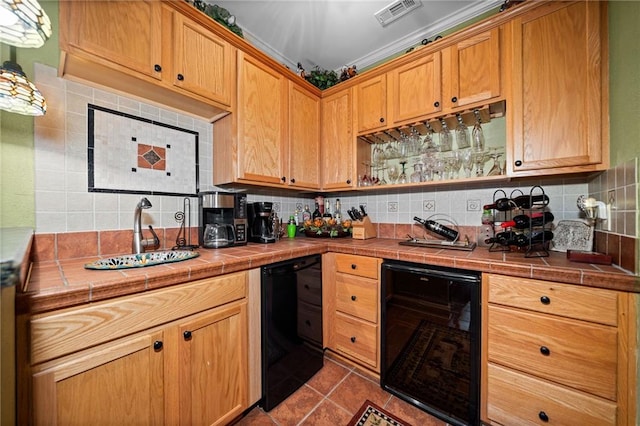 kitchen featuring visible vents, tile counters, wine cooler, dark tile patterned floors, and decorative backsplash