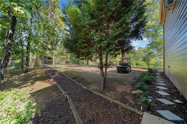 view of yard featuring a patio area and fence