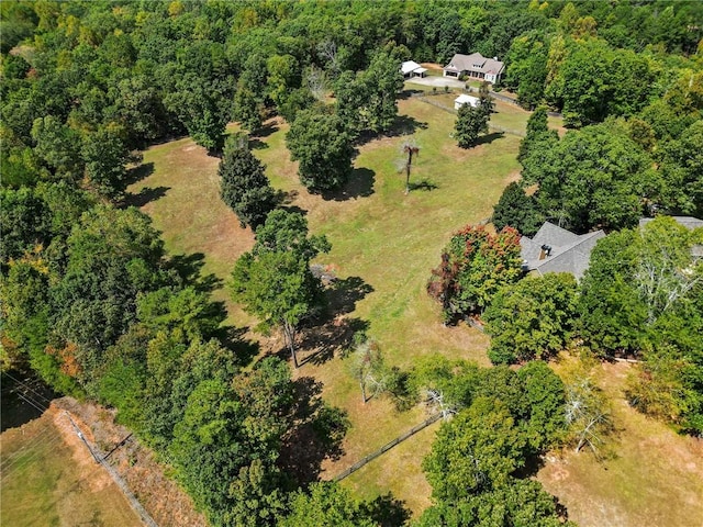 aerial view featuring a view of trees