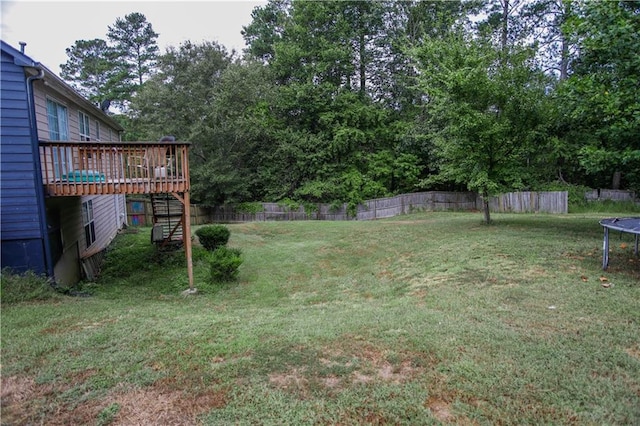 7930 River Fall Ct, Ball Ground, GA 30107 - view of yard with a trampoline, stairs, and a wooden deck