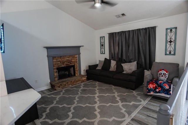 7930 River Fall Ct, Ball Ground, GA 30107 - living room with wood finished floors, ceiling fan, vaulted ceiling, and a stone fireplace