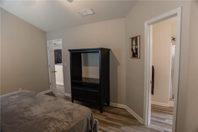7930 River Fall Ct, Ball Ground, GA 30107 - bedroom featuring wood finished floors and baseboards