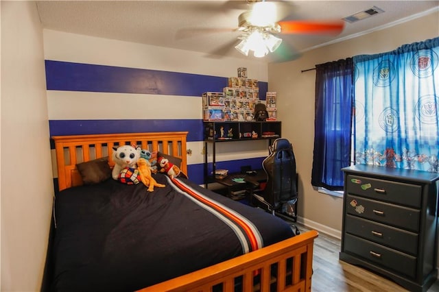 7930 River Fall Ct, Ball Ground, GA 30107 - bedroom featuring wood finished floors and a ceiling fan