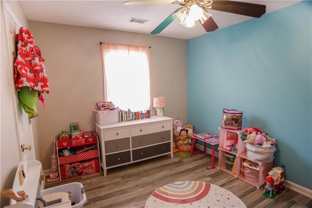 7930 River Fall Ct, Ball Ground, GA 30107 - recreation room featuring a ceiling fan and wood finished floors
