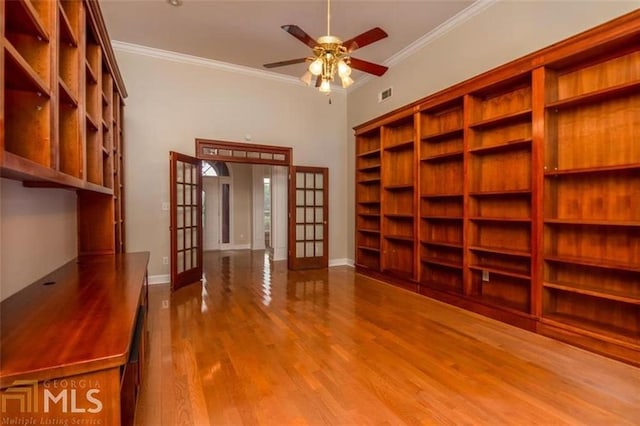 1090 Crown River Pkwy, Mcdonough, GA 30252 - unfurnished office featuring french doors, wood finished floors, ornamental molding, a ceiling fan, and baseboards