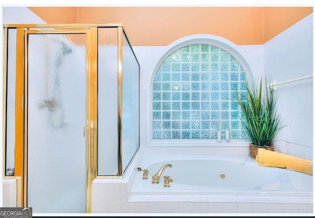 1090 Crown River Pkwy, Mcdonough, GA 30252 - bathroom with a stall shower and a tub with jets