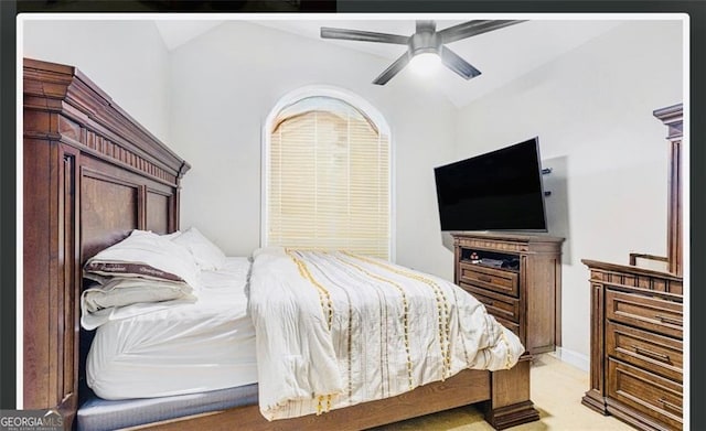 1090 Crown River Pkwy, Mcdonough, GA 30252 - bedroom featuring lofted ceiling, light colored carpet, and ceiling fan