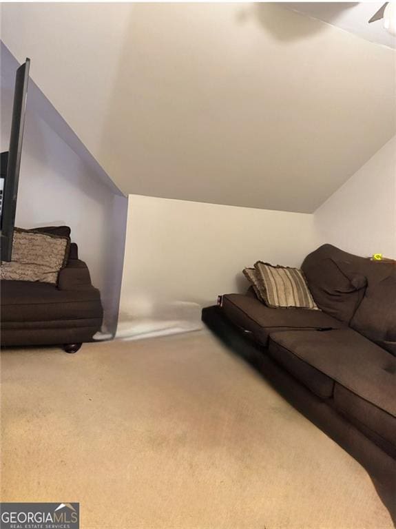 1090 Crown River Pkwy, Mcdonough, GA 30252 - living area with carpet floors, vaulted ceiling, and ceiling fan