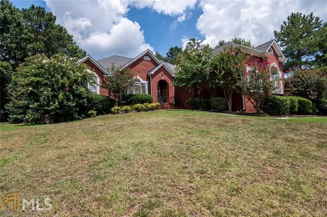 1090 Crown River Pkwy, Mcdonough, GA 30252 - view of front of home featuring a front yard and brick siding