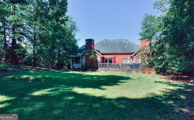 1090 Crown River Pkwy, Mcdonough, GA 30252 - view of yard with a deck