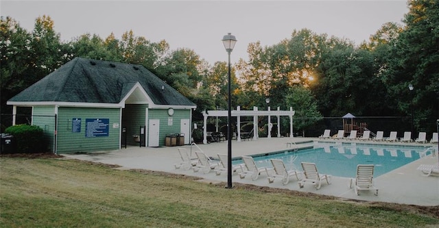 1090 Crown River Pkwy, Mcdonough, GA 30252 - community pool with a patio area, a yard, a pergola, and view of wooded area