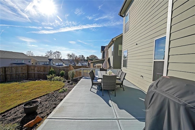 view of patio featuring a grill