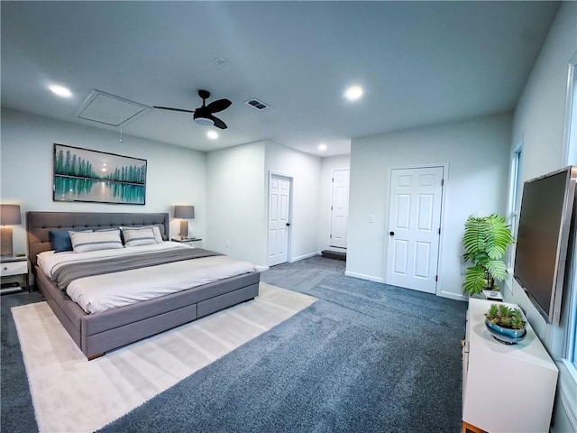 bedroom with dark colored carpet and ceiling fan