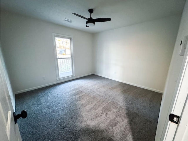 carpeted empty room with ceiling fan