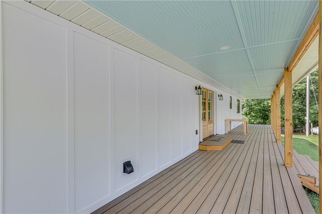 wooden terrace featuring a porch