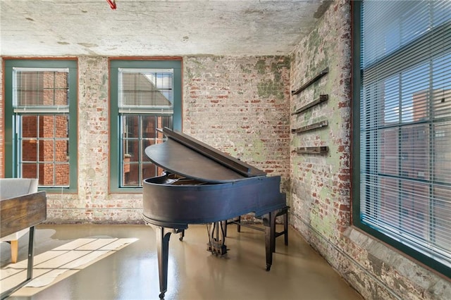 170 Boulevard Se E414, Atlanta, GA 30312 - sitting room featuring concrete floors and brick wall