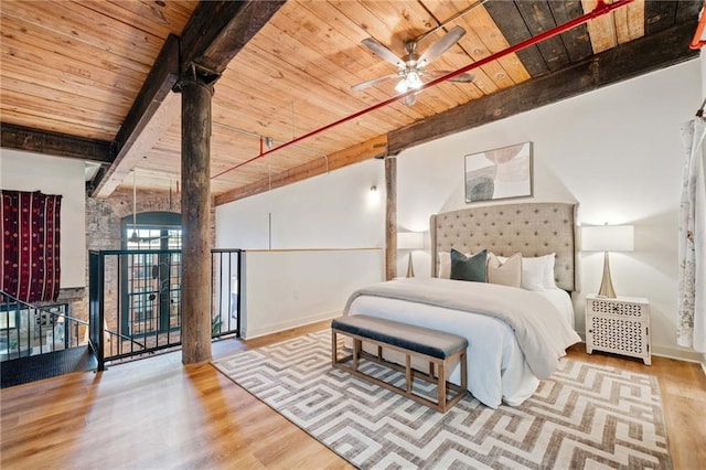 170 Boulevard Se E414, Atlanta, GA 30312 - bedroom with wood ceiling with exposed beams, wood finished floors, and baseboards