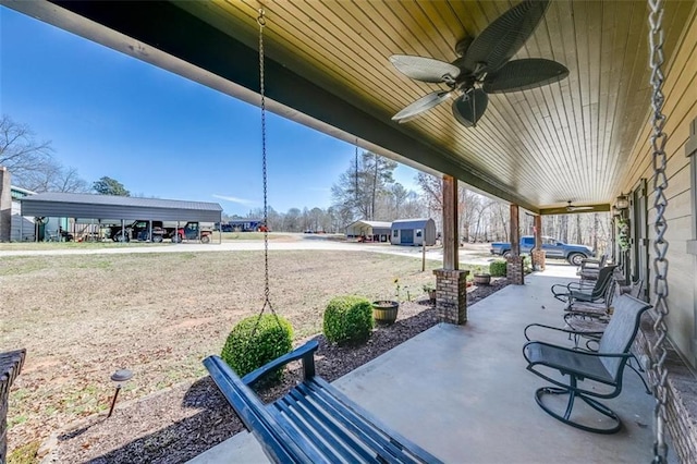 view of patio / terrace featuring a ceiling fan