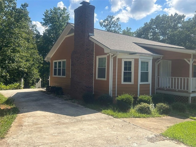 view of home's exterior featuring covered porch