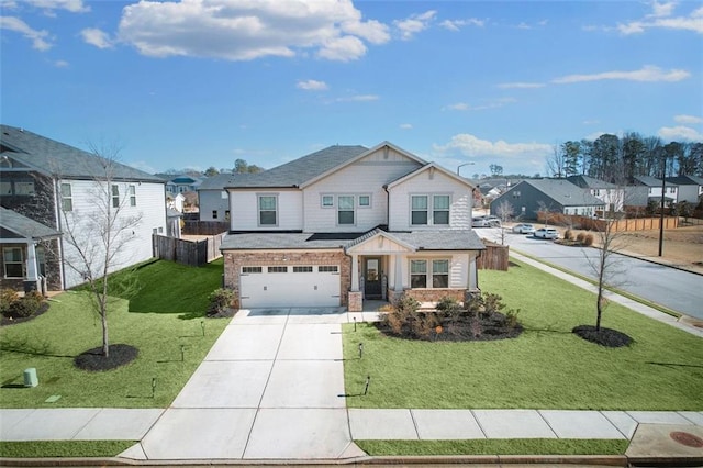 view of front of home with a front lawn and a garage