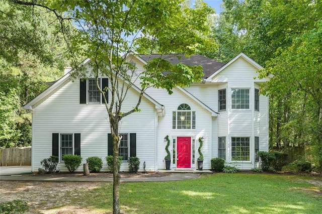 view of front of property with a front lawn