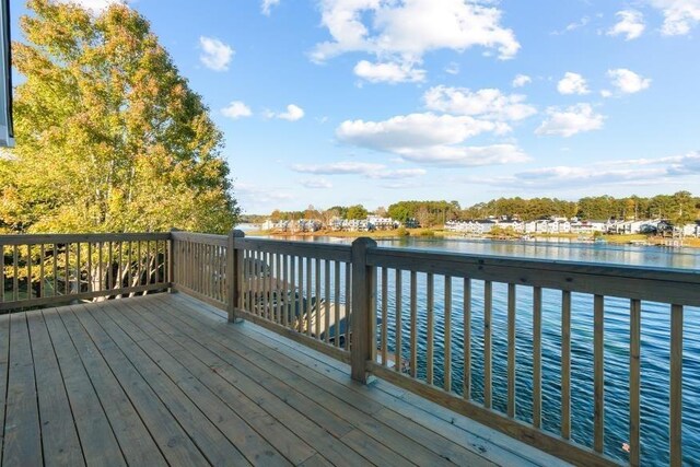 deck featuring a water view