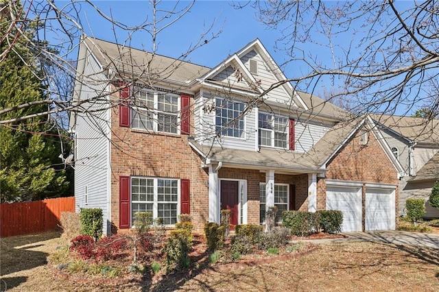 view of front of property with a garage