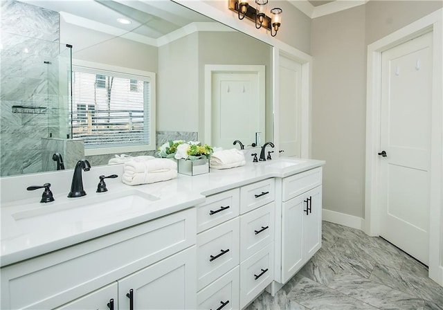 bathroom with marble finish floor, double vanity, a sink, and a shower stall