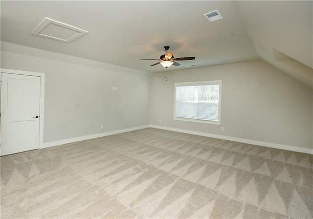 bonus room featuring visible vents, baseboards, attic access, and light colored carpet