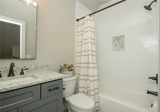 full bath with shower / bath combo with shower curtain, vanity, and toilet