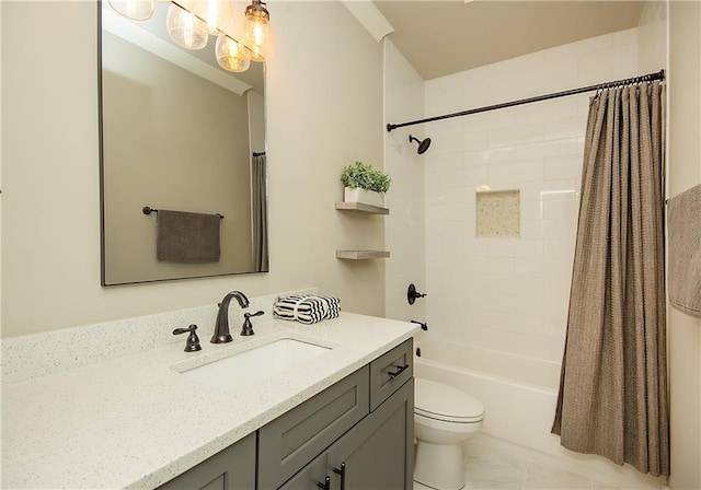 full bath featuring toilet, shower / bath combo with shower curtain, and vanity