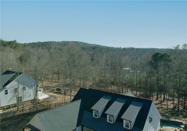 view of mountain feature with a view of trees